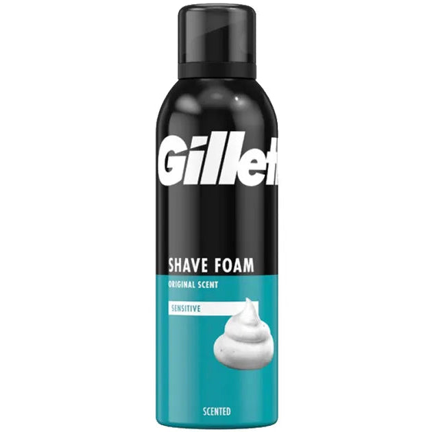 Gillette Shave Foam Sensitive in Original Scents, 250ml can, featuring a black top and a teal lower section with a white shaving foam graphic, on a plain white background. Wholesale bulk supply 121 wholesale