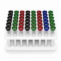 12 cm Down Pipes For Bongs Pack OF 48 organized in a white plastic storage rack, featuring black, green, red, and blue anodized metal cups with silver steel inner shells.