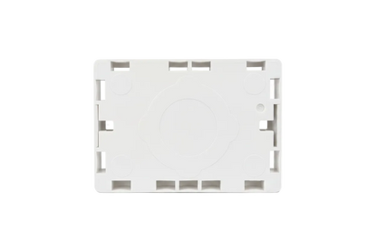 A white plastic mounting plate or bracket, sealed inside a clear plastic hanging bag, shown against a plain white background.