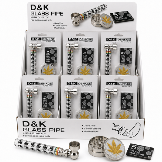 A retail display box filled with packaged D&K Denke Glass Pipe products, shown with several loose silver glass pipes, screens, and a metal grinder in front on a white background.