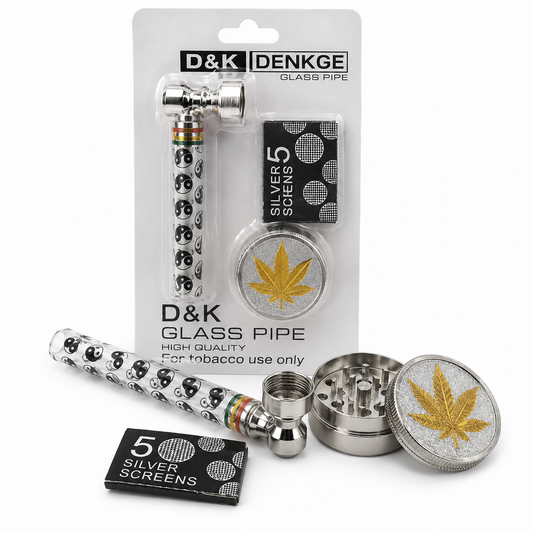 D&K Denke glass pipe set in retail packaging, including a silver-patterned glass pipe, metal grinder, screen, and branded card, on a white background.