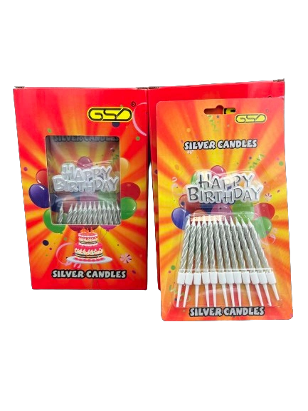Birthday candles and holders; two red GSD boxes with silver candles and white holders.