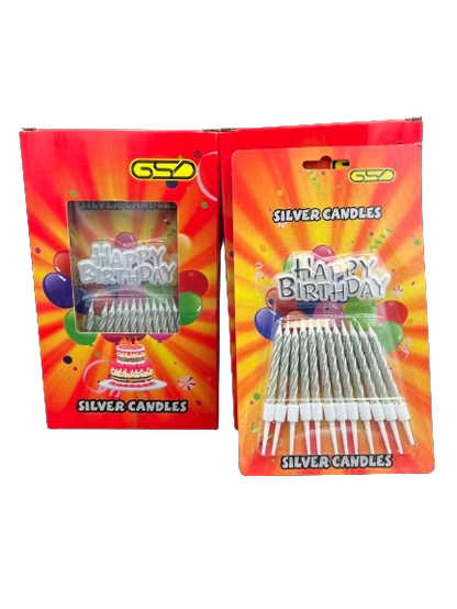 Birthday candles and holders; two red GSD boxes with silver candles and white holders.
