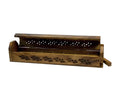 Wooden incense burner and storage box with carved floral pattern; holds incense sticks.
