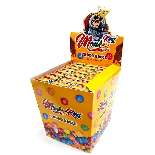 Monkey King Connoisseur Flavoured Rolling Papers display box with 24 packs of Choco Balls by 121 Wholesale