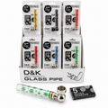 A retail display box containing twenty four packaged D&K glass pipes with metal cup ends in different colors, with one assembled clear glass pipe with green leaf pattern and a silver bowl in front, plus a small black box labeled 5 silver screens, on a white background. Uk wholesale supplier| 121 WHoleale