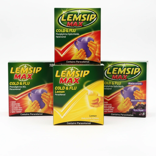 Lemsip Max Cold & Flu sachets, green boxes with lemon and blackcurrant flavors visible, set of 4